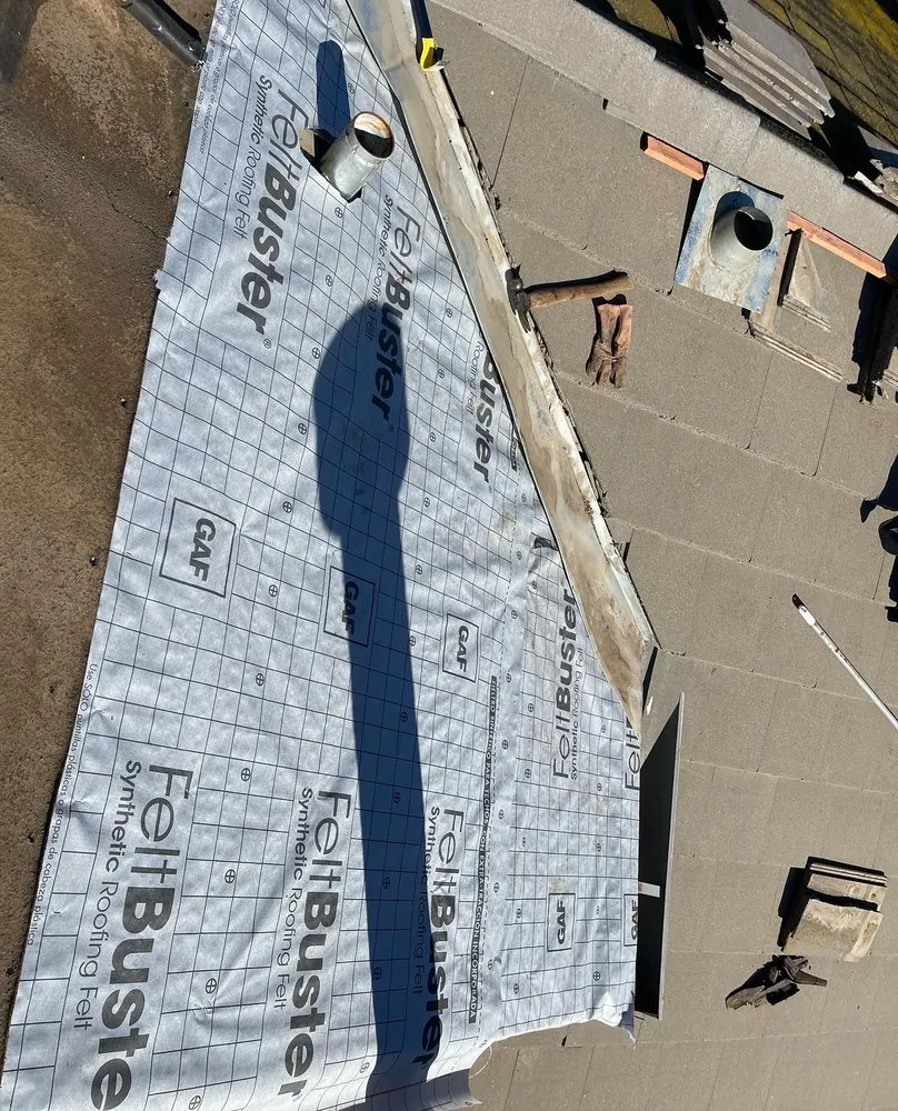 Slide of Fili's Roofing