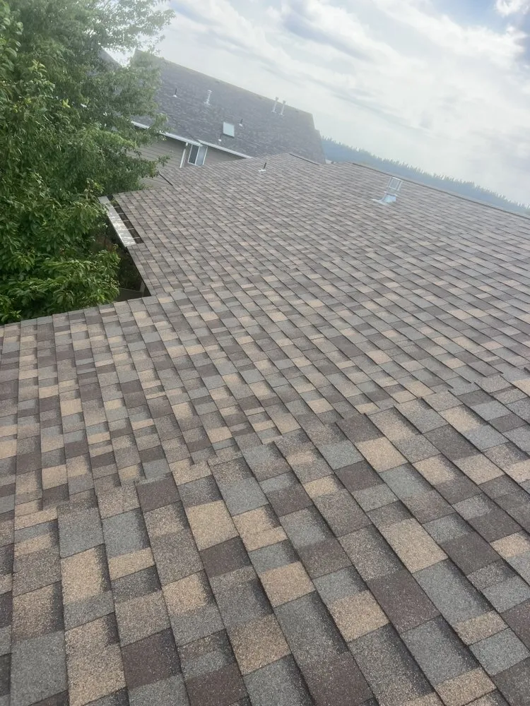 Local flat roof repair after storm damage across Otis Orchards, WA - Firefly Contractors & Design