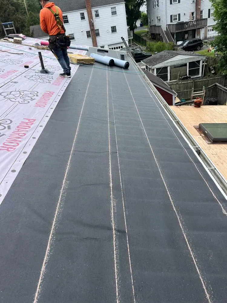 Professional shingle roofing service after storm damage in Rock Tavern, NY by Firehouse Roofing