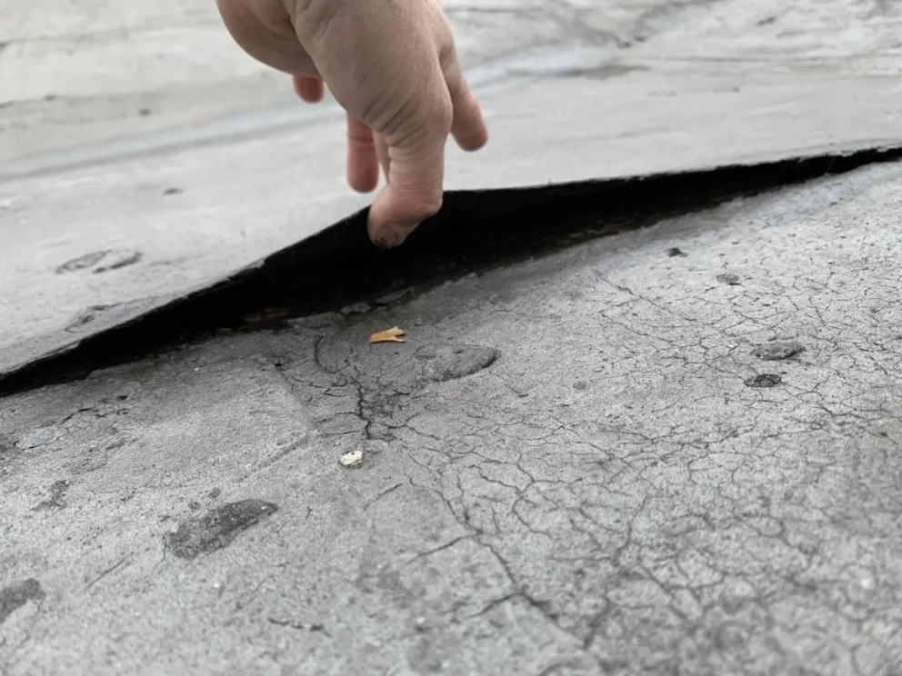 Slide of First Class Roofing