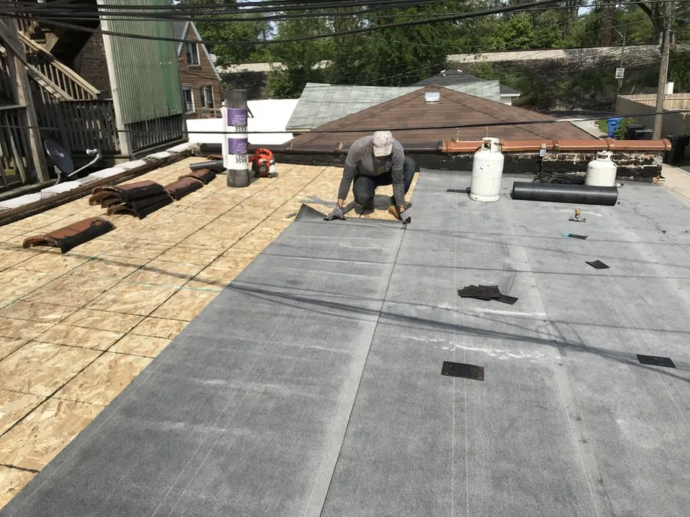 Slide of First Class Roofing