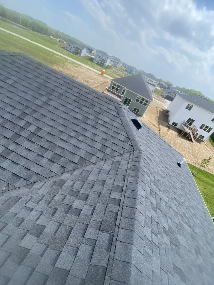 Slide of First Class Roofing