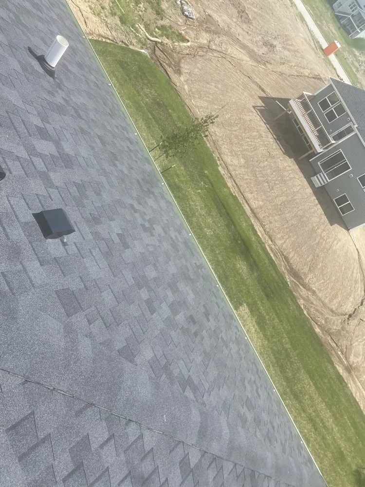 Slide of First Class Roofing