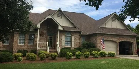 Slide of First Class Roofing