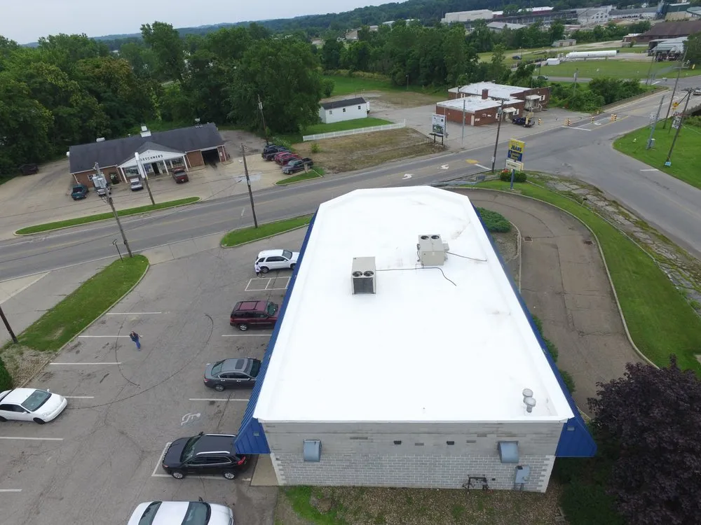 Slide of First Class Roofing