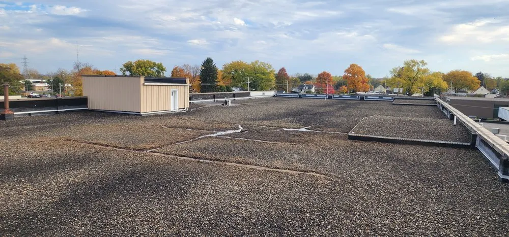 Slide of First Class Roofing