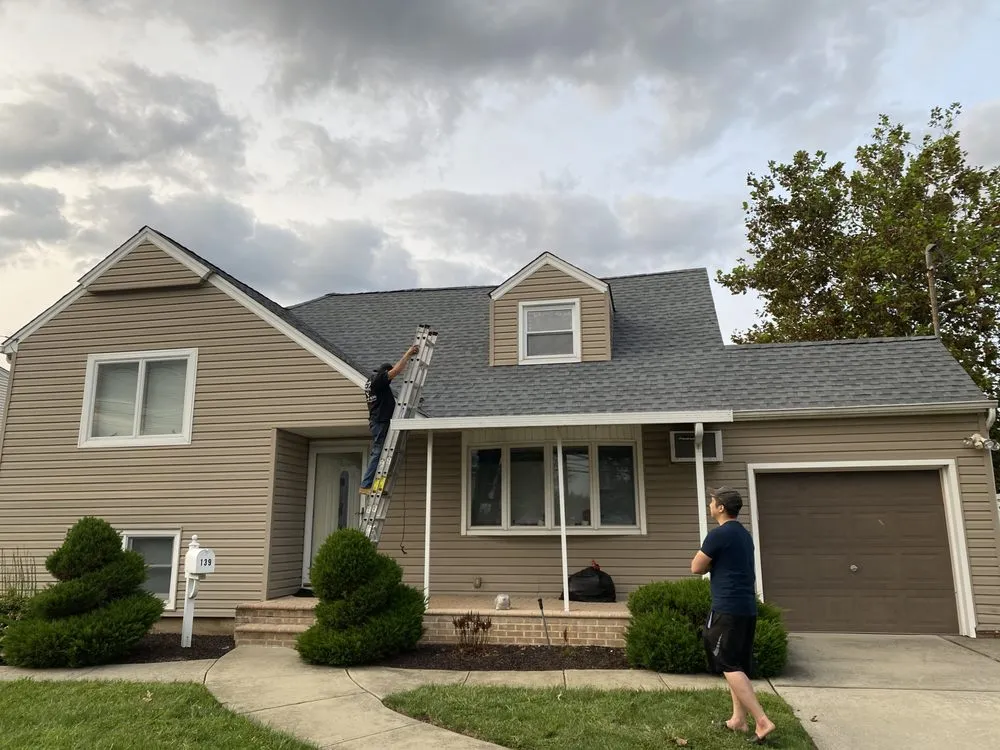 Slide of First Class Roofing