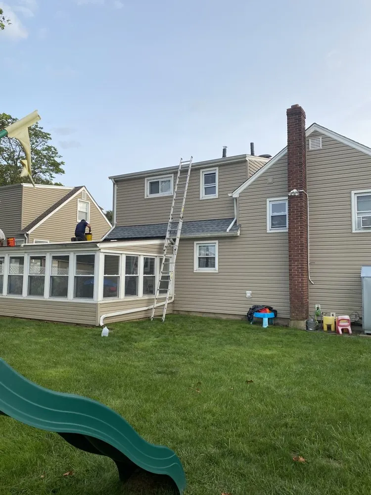 Slide of First Class Roofing