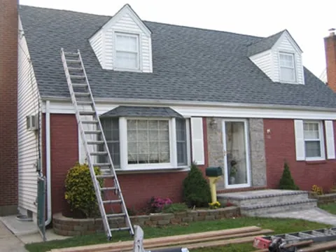 Slide of First Class Roofing