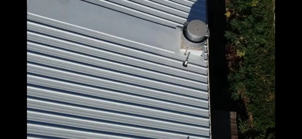 Slide of First Class Roofing