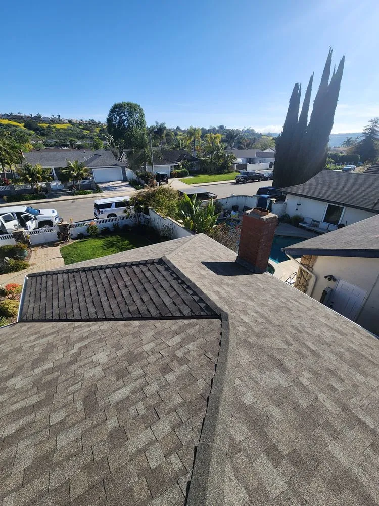 Slide of First Division Roofing
