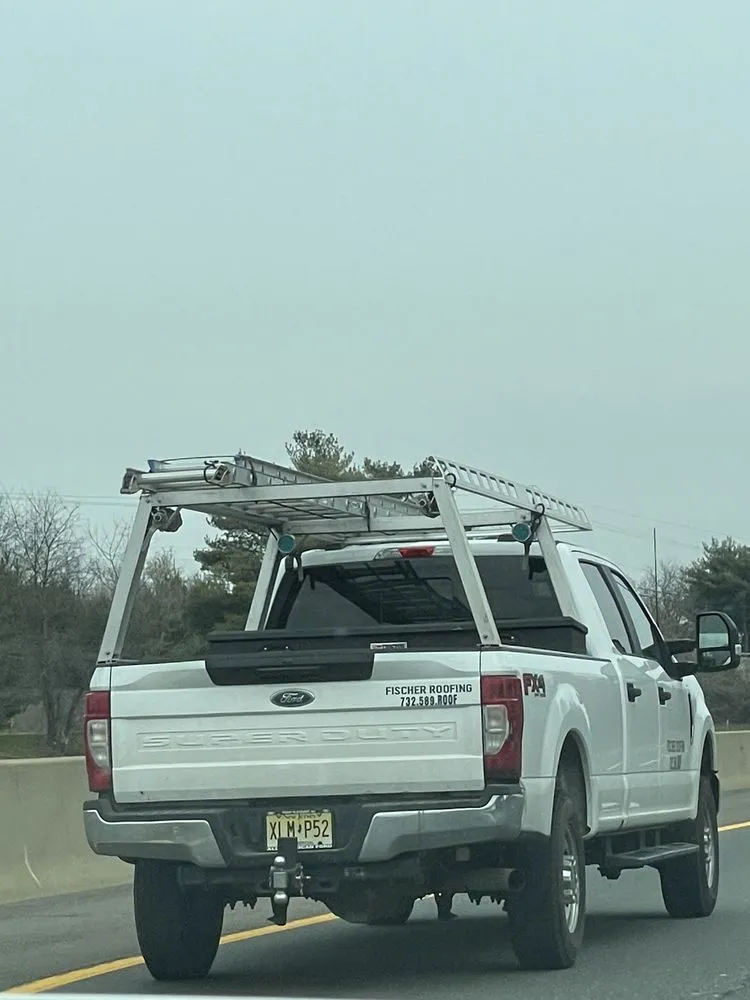 Slide of Fischer's Roofing
