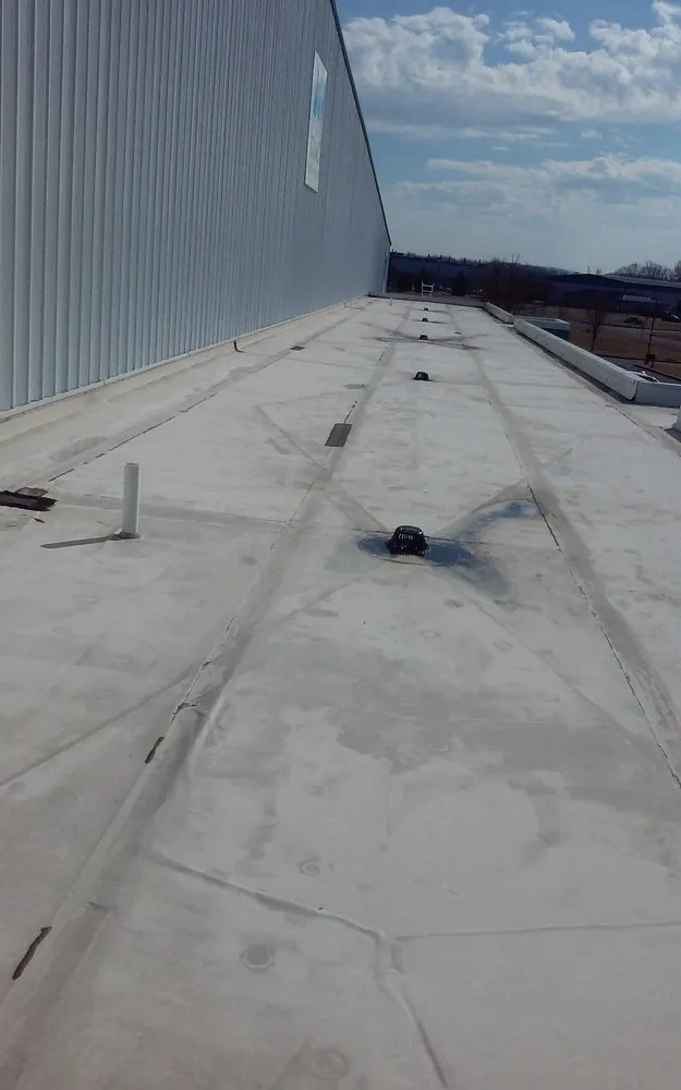 Slide of Fisher Roof Solutions