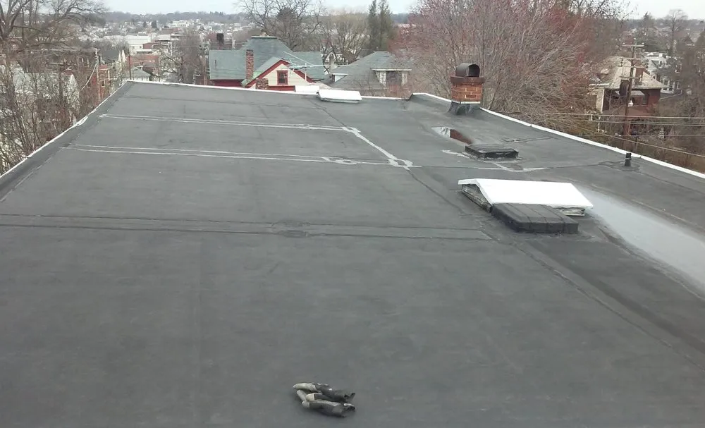 Slide of Fisher Roof Solutions