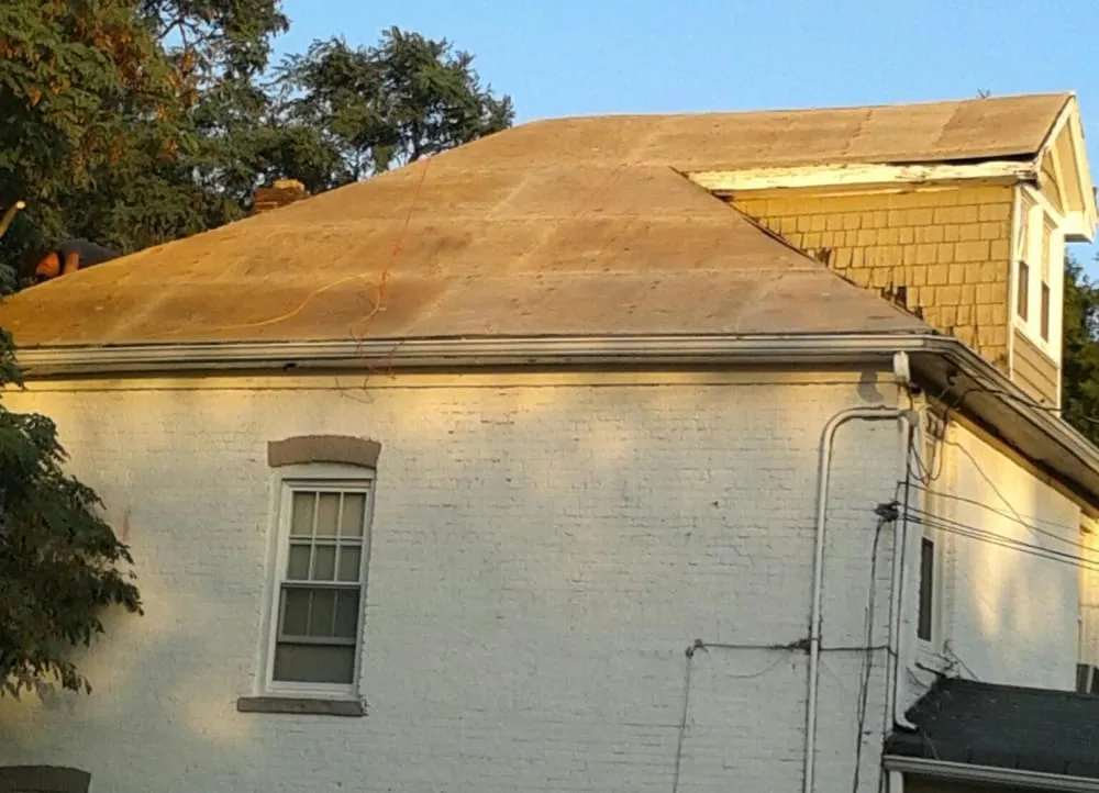 Slide of Fisher Roofing