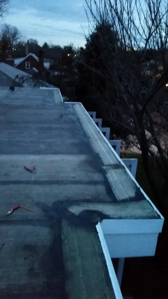 Slide of Fisher Roofing