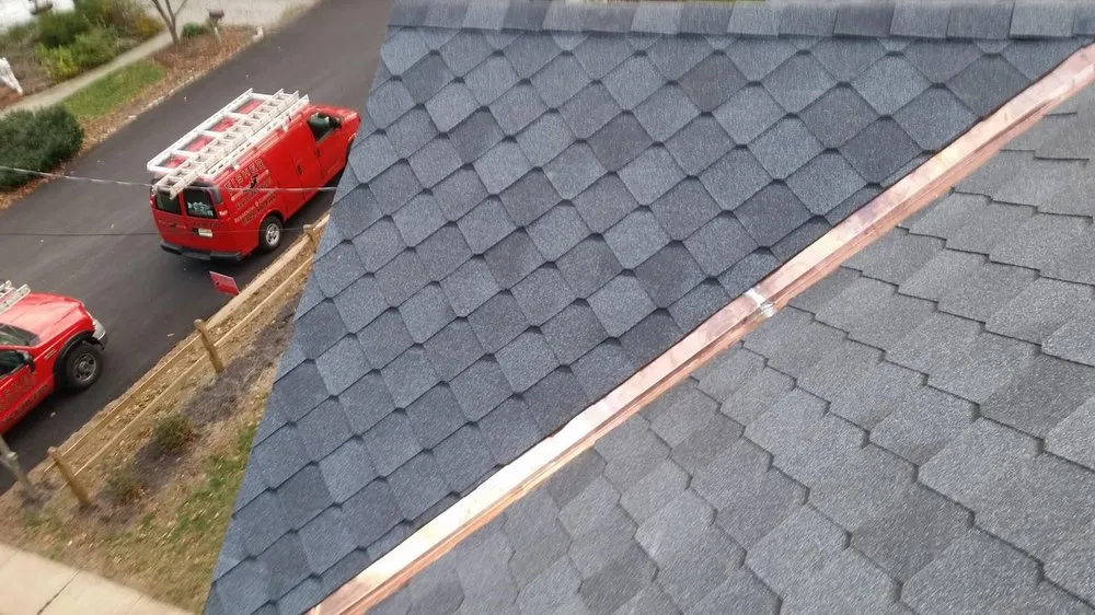 Slide of Fisher Roofing