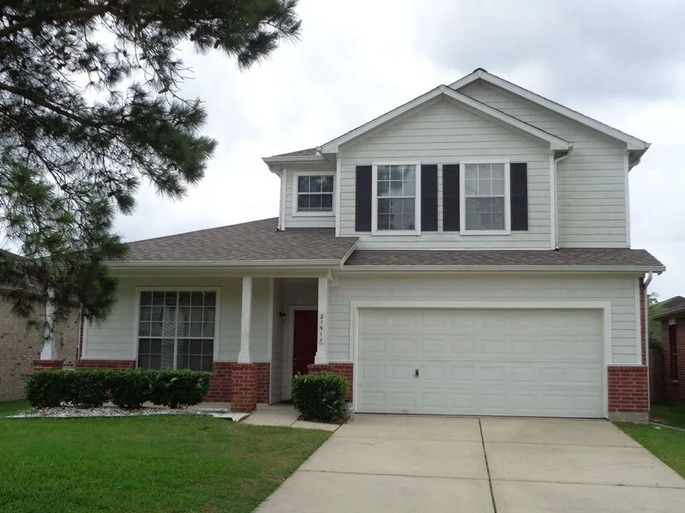 Slide of Fitz Roofing