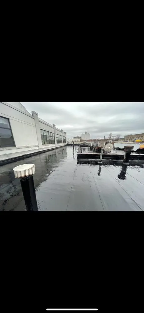 Slide of Five Boroughs Roofing