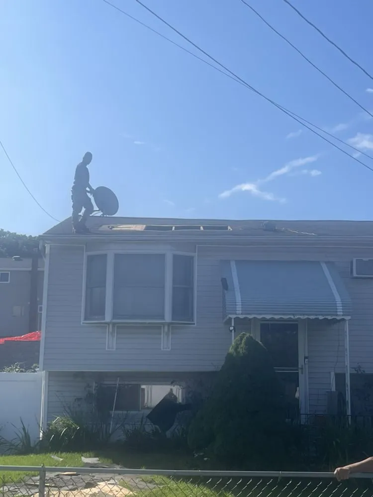 Slide of Five Boroughs Roofing