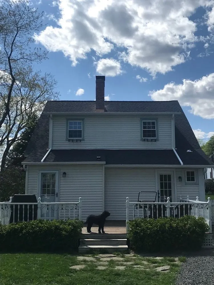 Slide of Five Boroughs Roofing