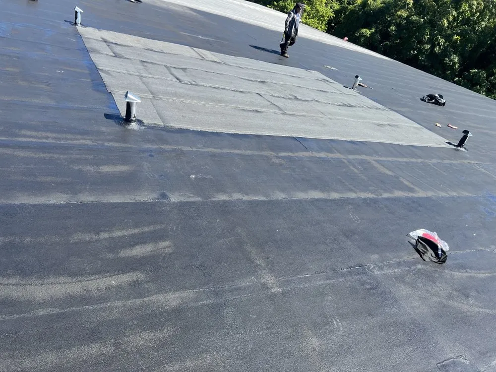 Slide of Five Boroughs Roofing