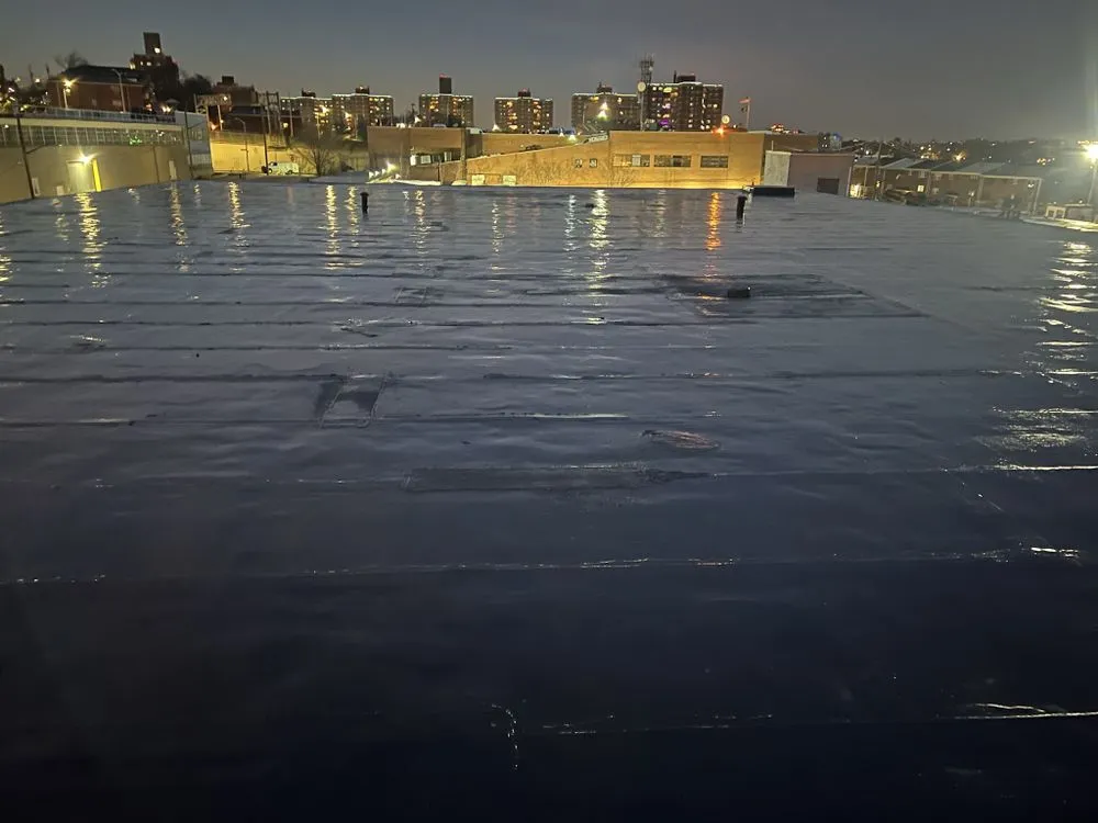 Slide of Five Boroughs Roofing