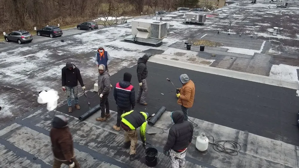 Slide of Five Boroughs Roofing