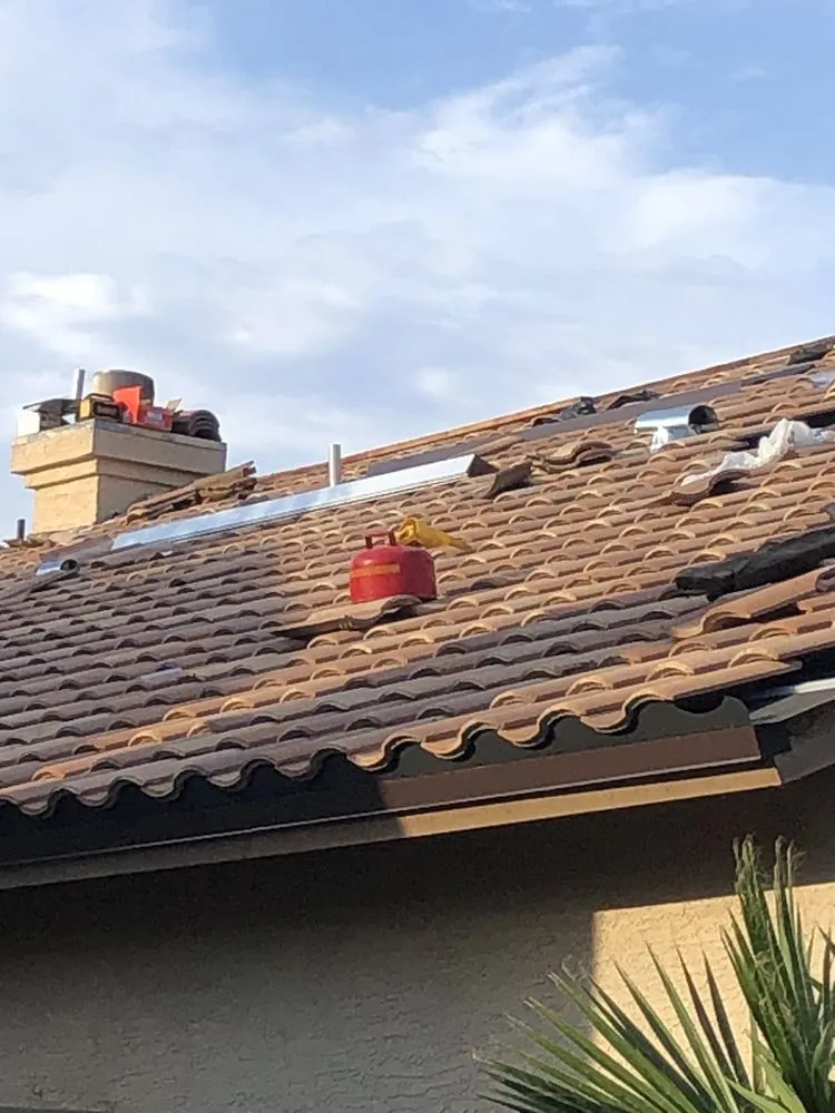 Slide of Five Guys Roofing