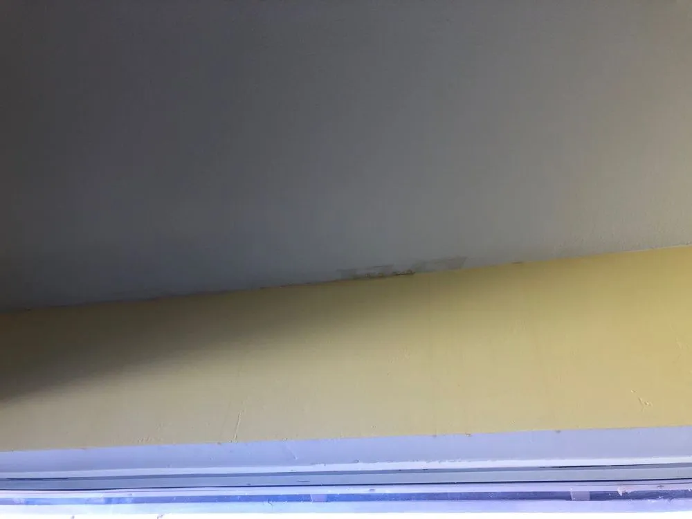 Slide of Five Guys Roofing