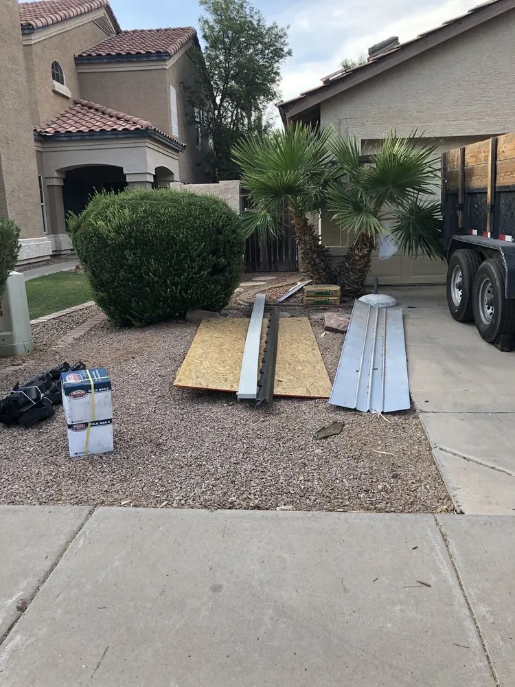 Slide of Five Guys Roofing