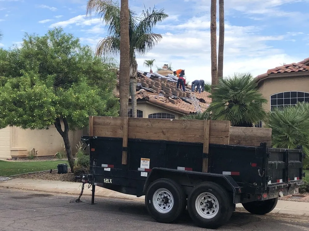 Slide of Five Guys Roofing