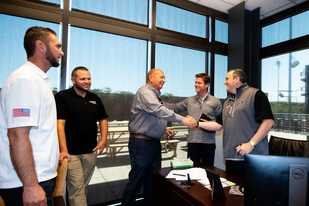 Slide of Five Guys Roofing