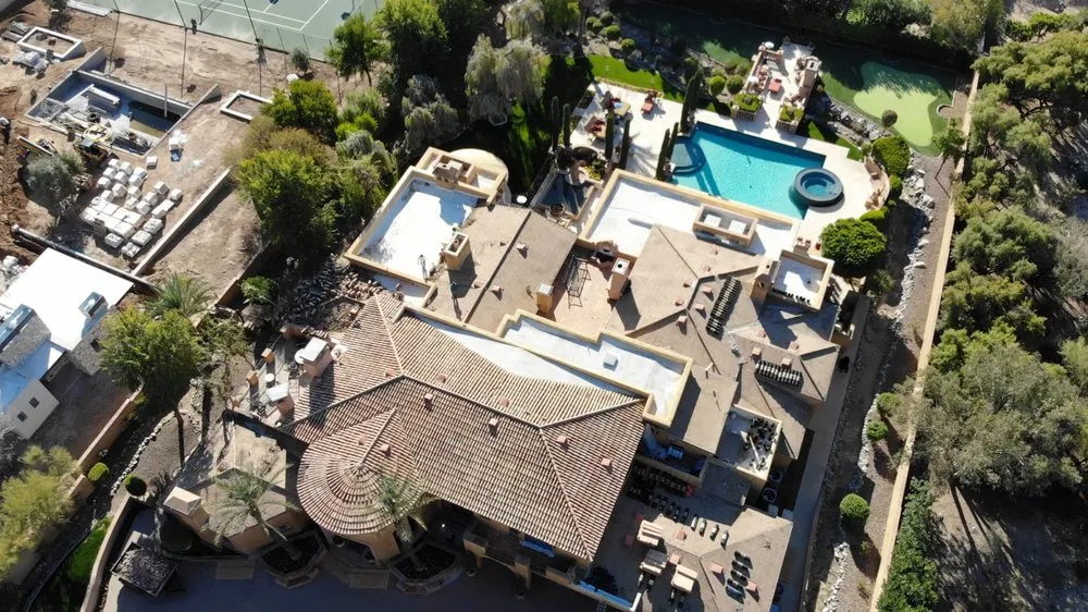 Slide of Five Guys Roofing