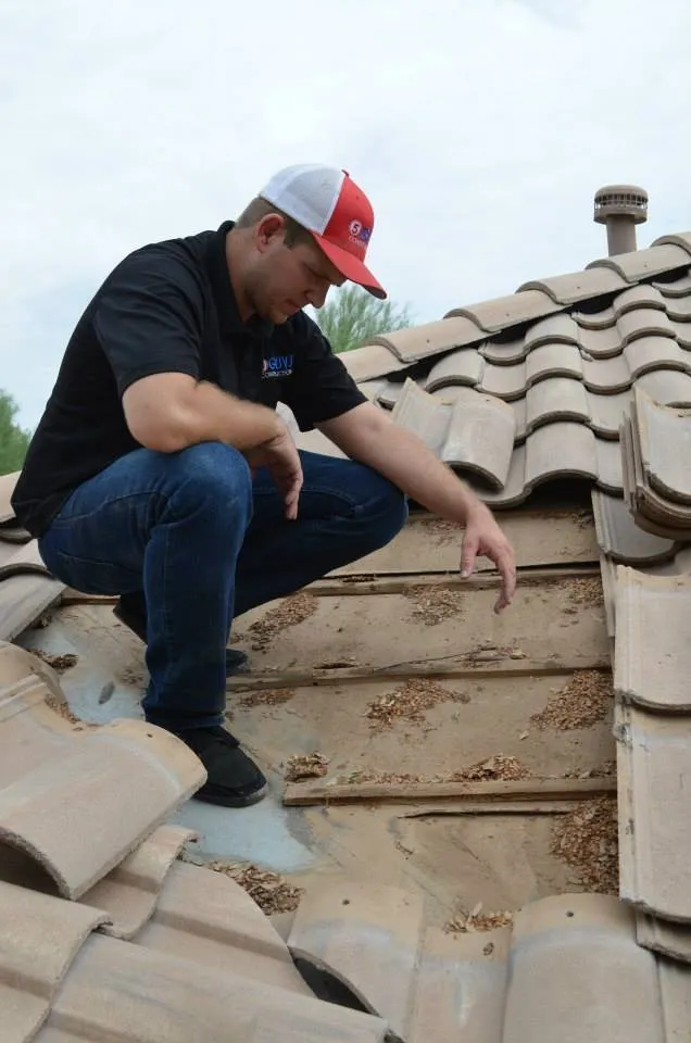 Slide of Five Guys Roofing