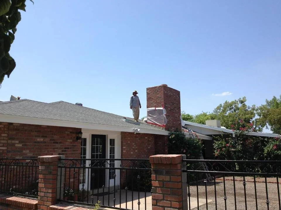 Slide of Five Guys Roofing