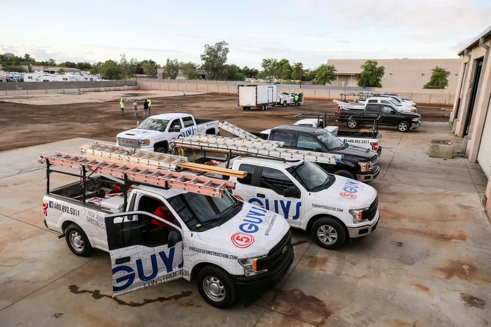 Slide of Five Guys Roofing
