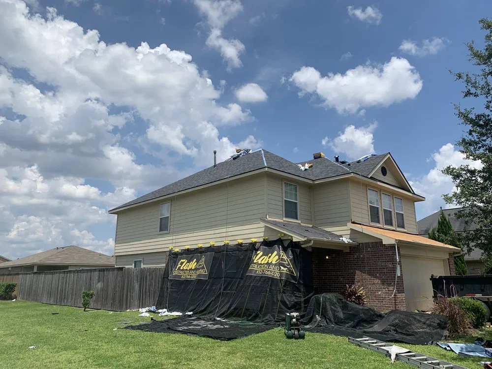 Slide of Flash Construction And Roofing