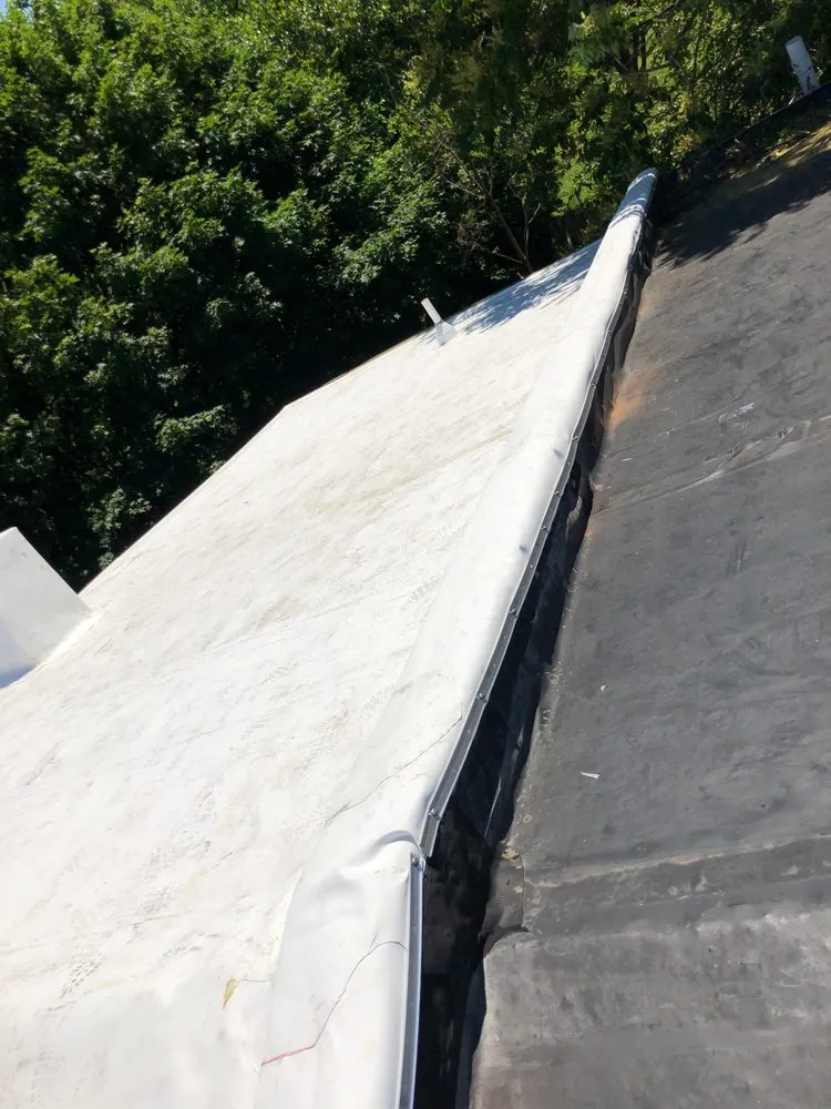 Slide of Flat Roof Company