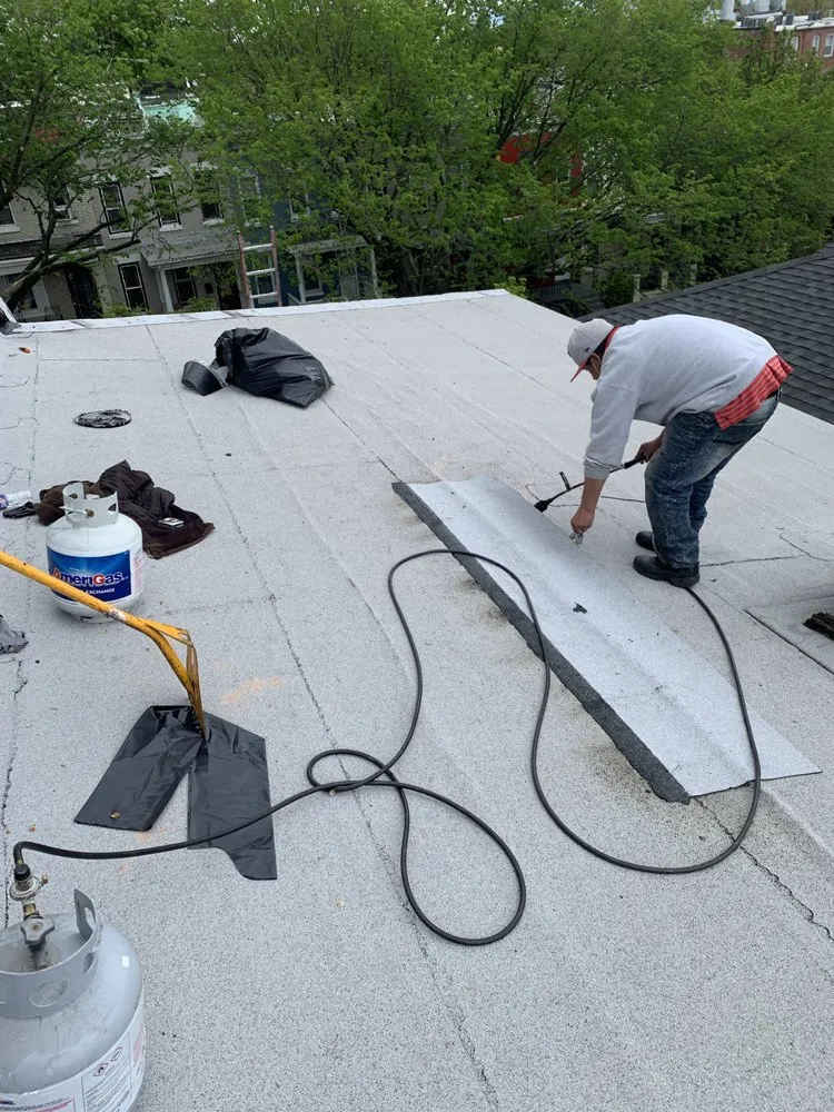 Slide of Flat Roof Company