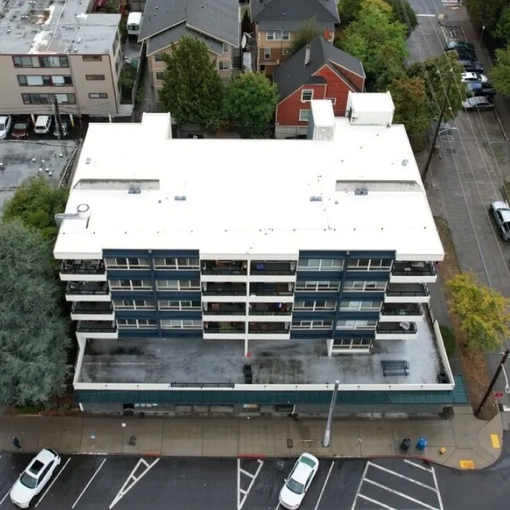 Slide of Flat Roof Pros