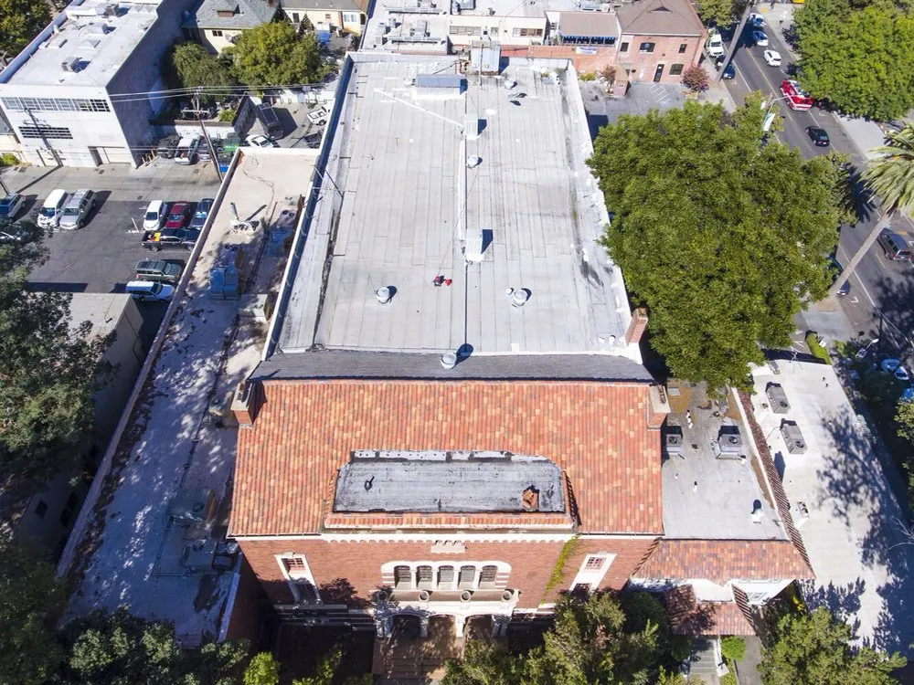 Slide of Flat Roof Pros