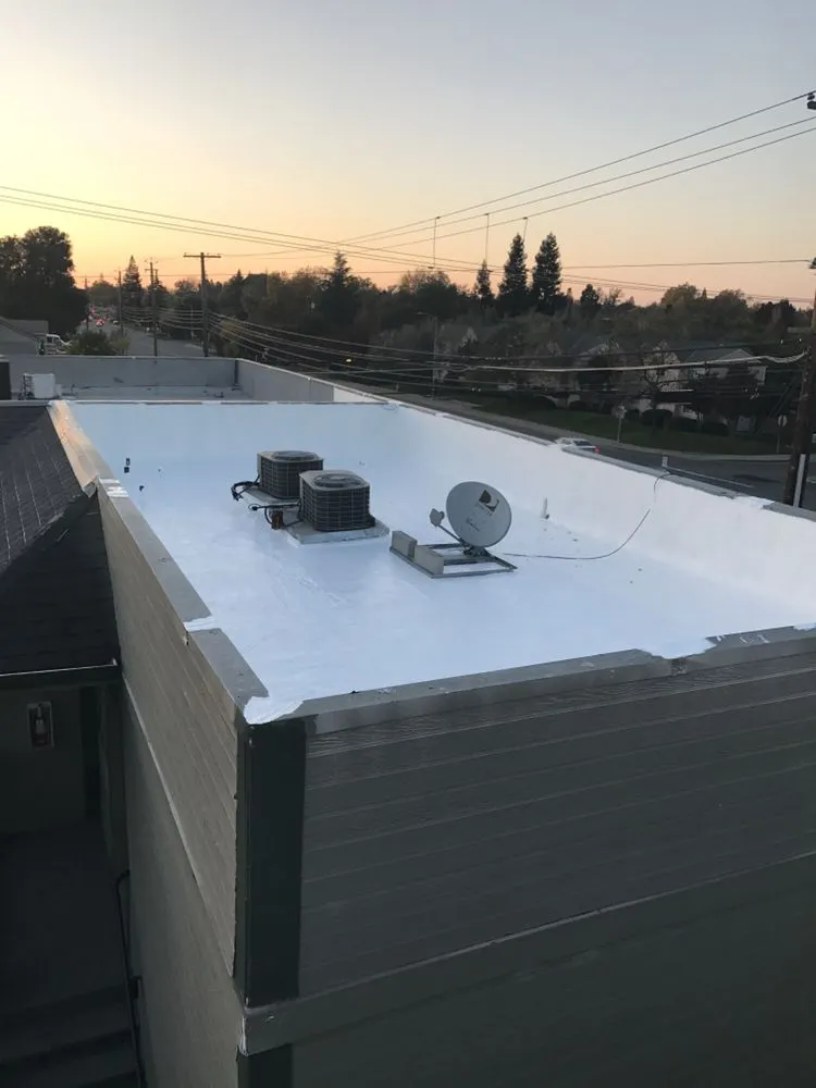 Slide of Flat Roof Pros