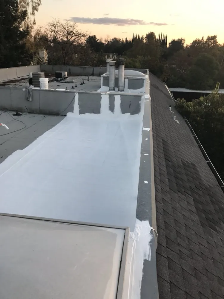 Slide of Flat Roof Pros