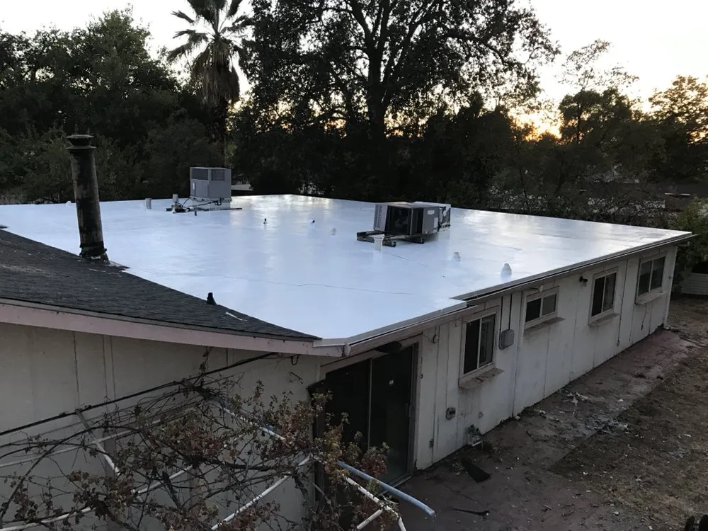 Slide of Flat Roof Pros