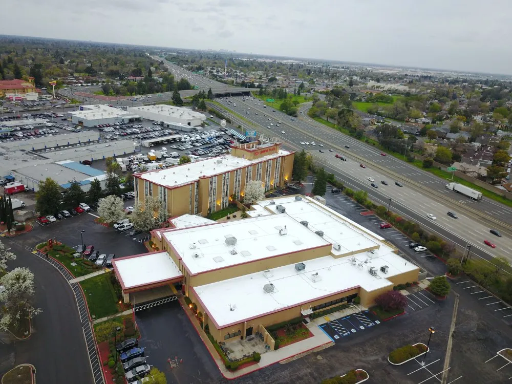 Slide of Flat Roof Pros