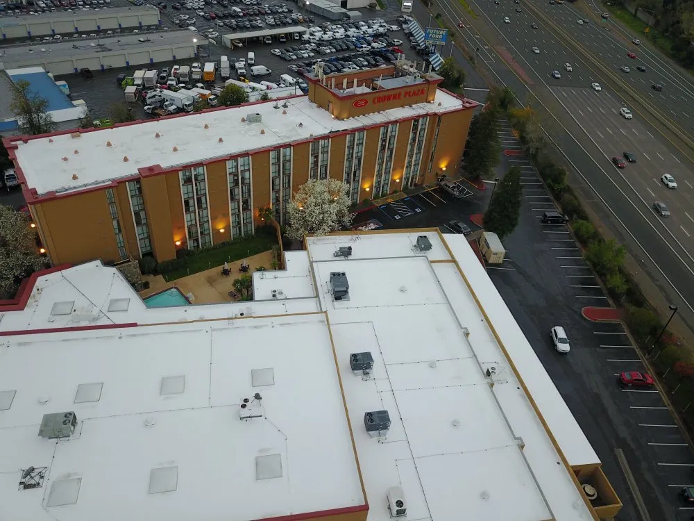 Slide of Flat Roof Pros