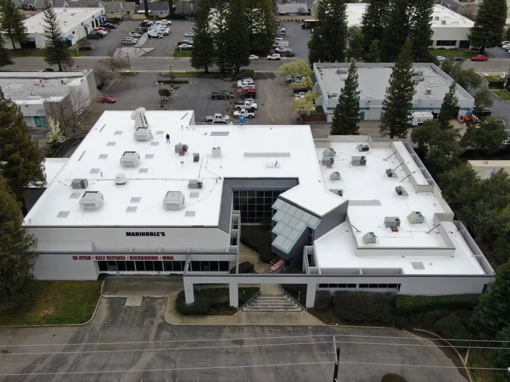 Slide of Flat Roof Pros