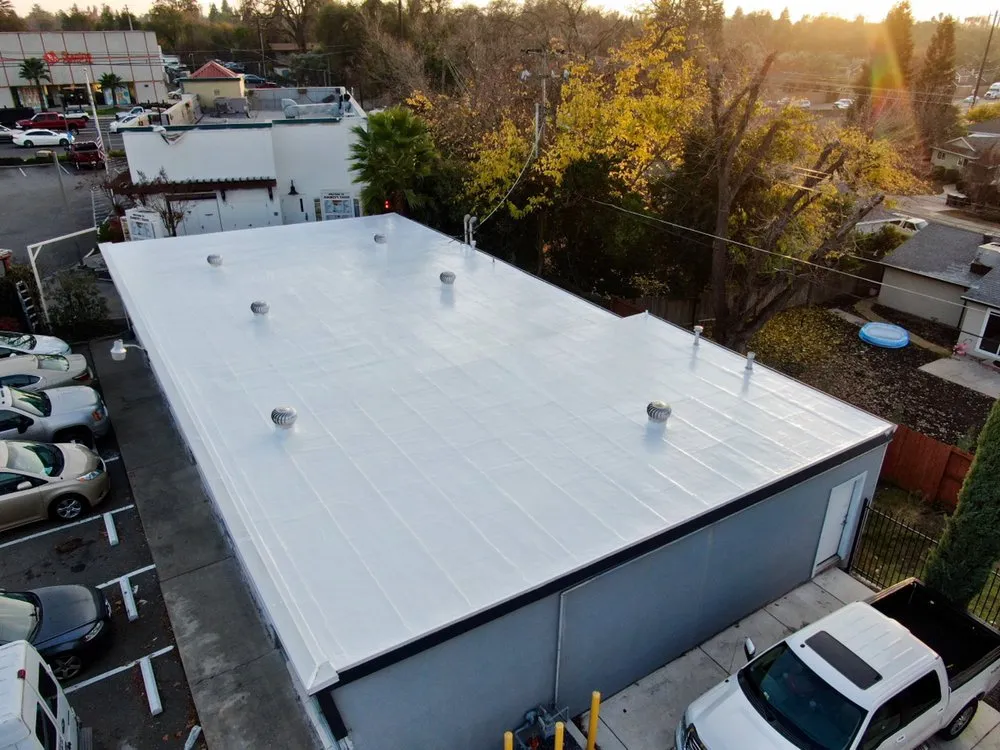 Slide of Flat Roof Pros