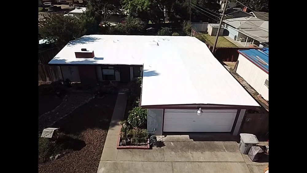 Slide of Flat Roof Pros